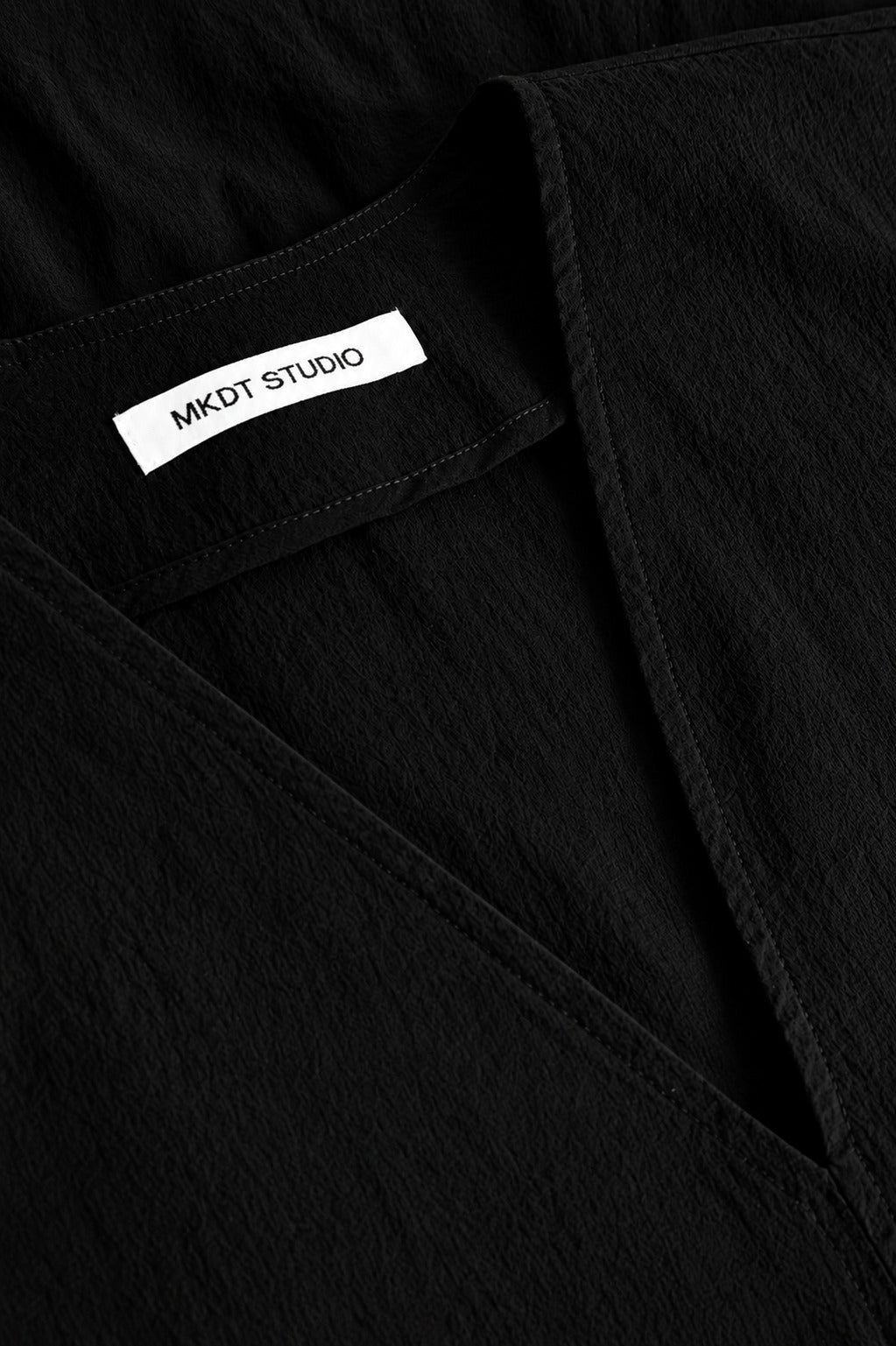 MKDT Studio TATE CRISP TECH Tops BLACK